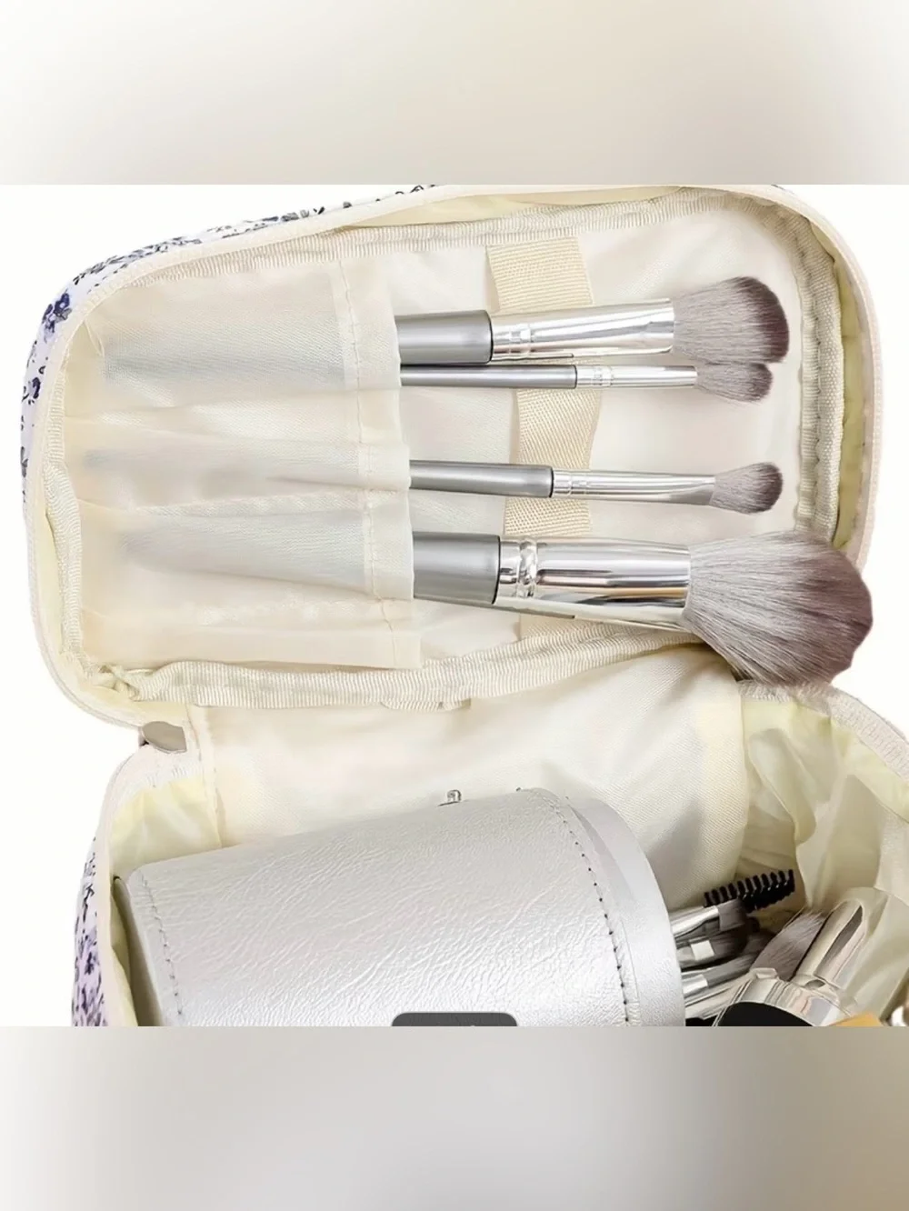 Floral print makeup bag suitable for travel and daily use.